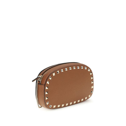 Valentino Garavani Brown Calf Leather Bos Taurus Shoulder Bag with platinum-finish studs and chain strap.