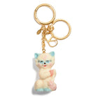 Valentino Garavani Le Chat De La Maison Nylon Bag Charm with Keychain featuring light beige cat and V logo charm on keyring