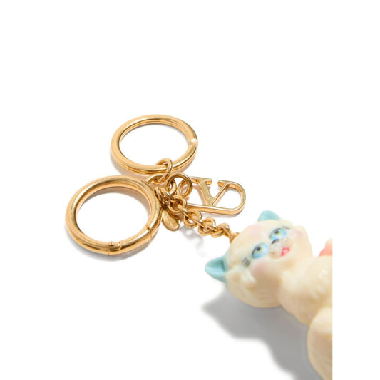 Valentino Garavani Le Chat De La Maison Nylon Bag Charm with Keychain featuring a light beige cat charm and V logo keyring.