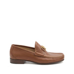 Valentino Garavani VLogo Signature loafers, foliage brown leather with flat sole, branded insole, 0.9-inch heel, penny slot.