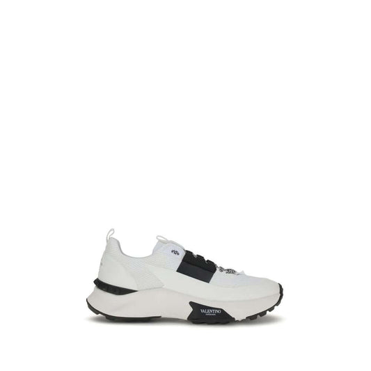 Alt Tag: Valentino Garavani White Calf Leather Bos Taurus Athletic Sneakers with custom rubber sole and logo details, side view.