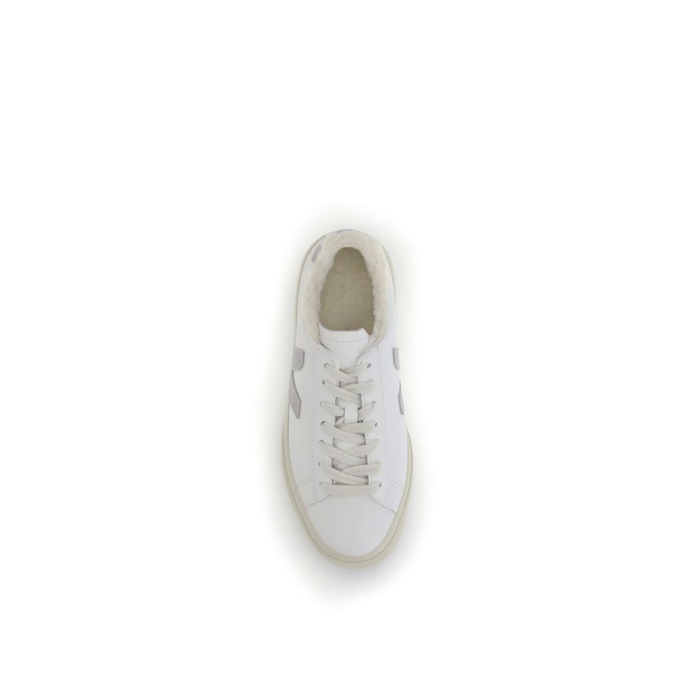 Veja White Calf Leather Bos Taurus Low Top Sneakers with round toe and lace-up closure, featuring a soft fur lining and distinctive design.