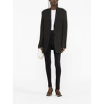 Model wearing WARDROBE.NYC Trousers Black with elasticated waist and rear slit. High waist stretch leggings paired with a blazer.