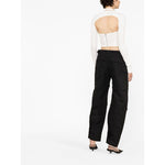 Back view of model wearing WARDROBE.NYC WARDROBE NYC Trousers Black with detachable legs and cargo pockets.