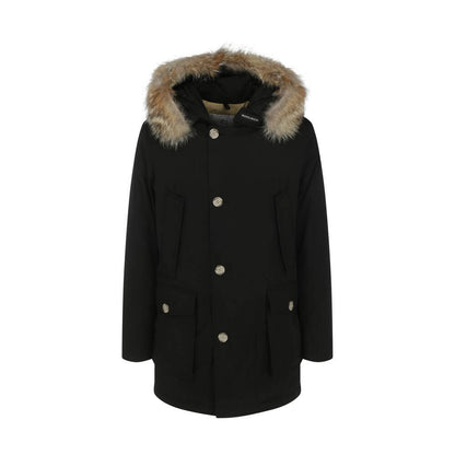 Woolrich Black Cotton Parka with fur hood, padded design, and front closure featuring zip and buttons, AW25 season.