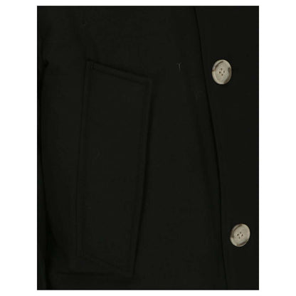 Woolrich Black Cotton Parka close-up showing button details and pocket.