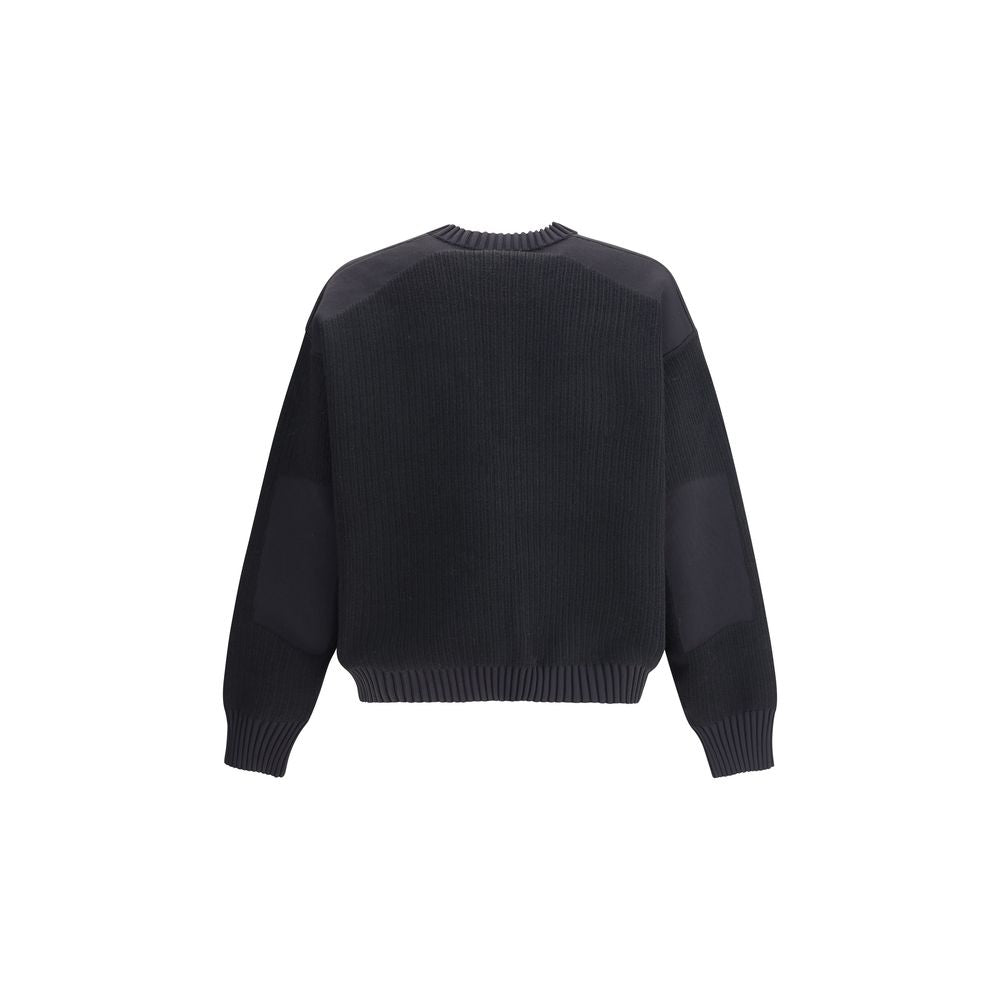 Y-3 Black Wool Sweatshirt with ribbed cuffs and hem, showcasing a relaxed fit and urban design.