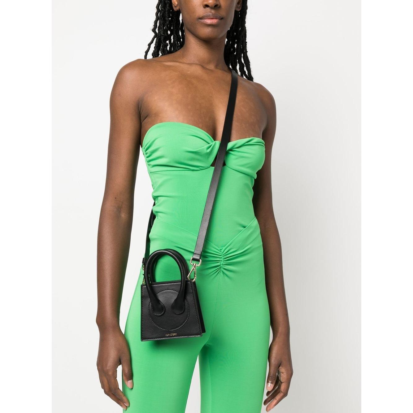 Front view with bag zipped and handles upright.